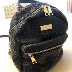 BCBG faux leather mini backpack